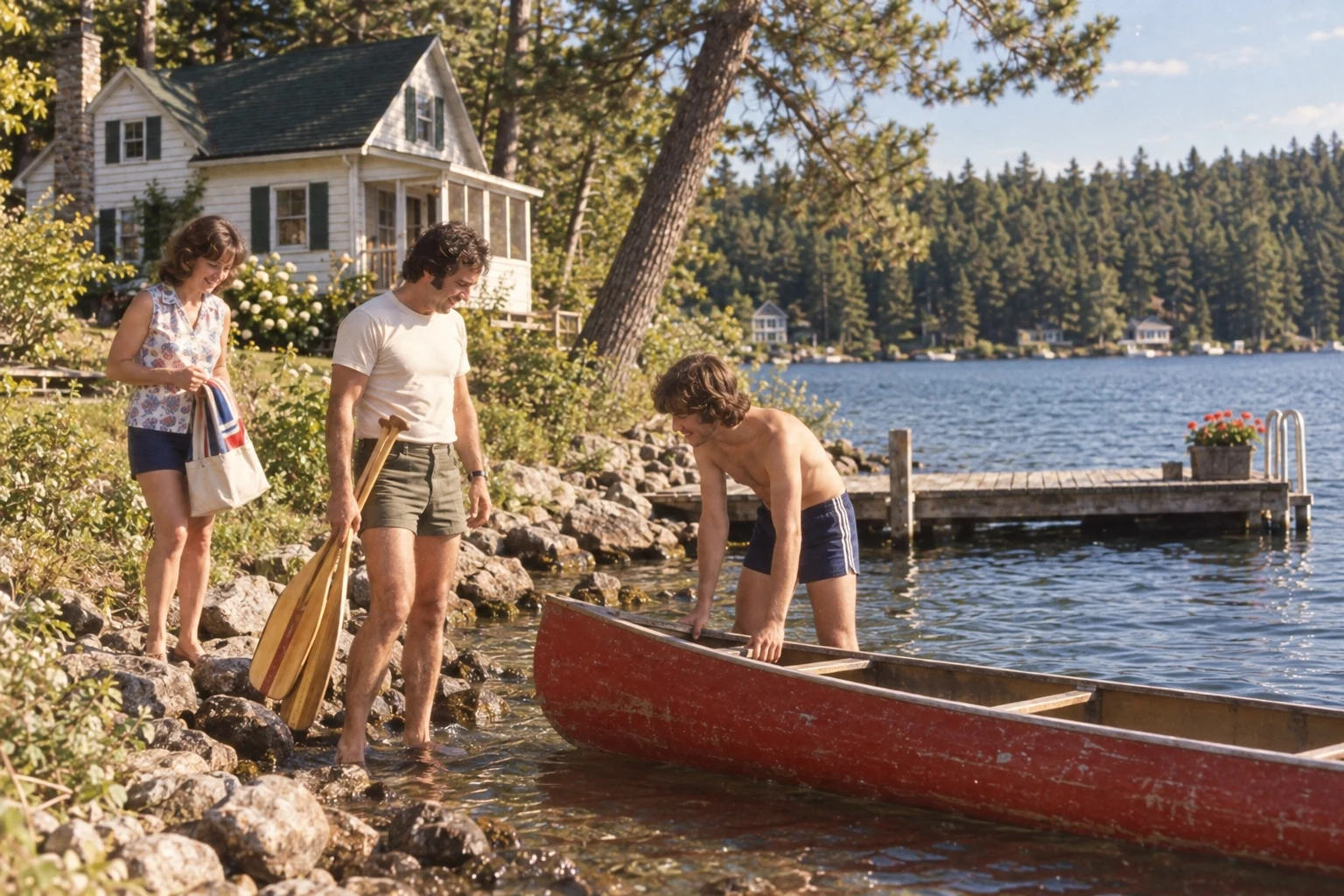 Family beside a lake cottage and a red canoe in 1972.